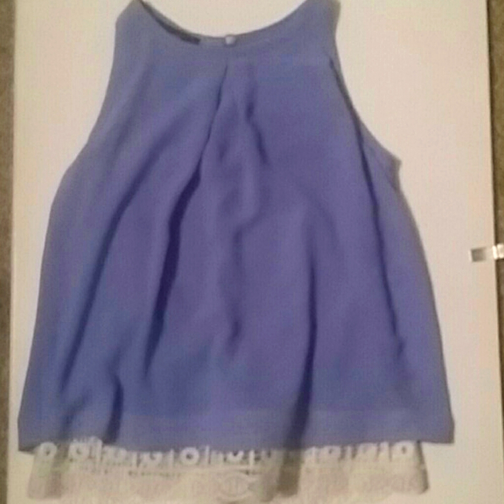 A tank top dressing up for a girl